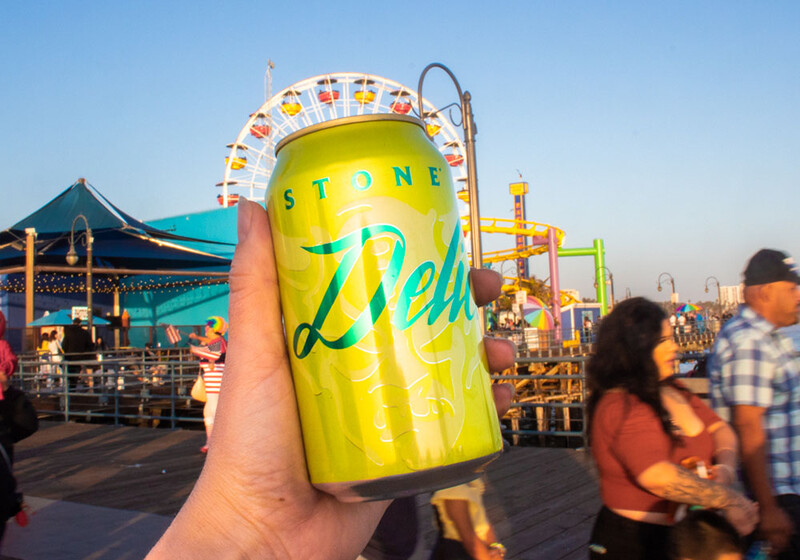 delicious ipa in front of ferris wheel