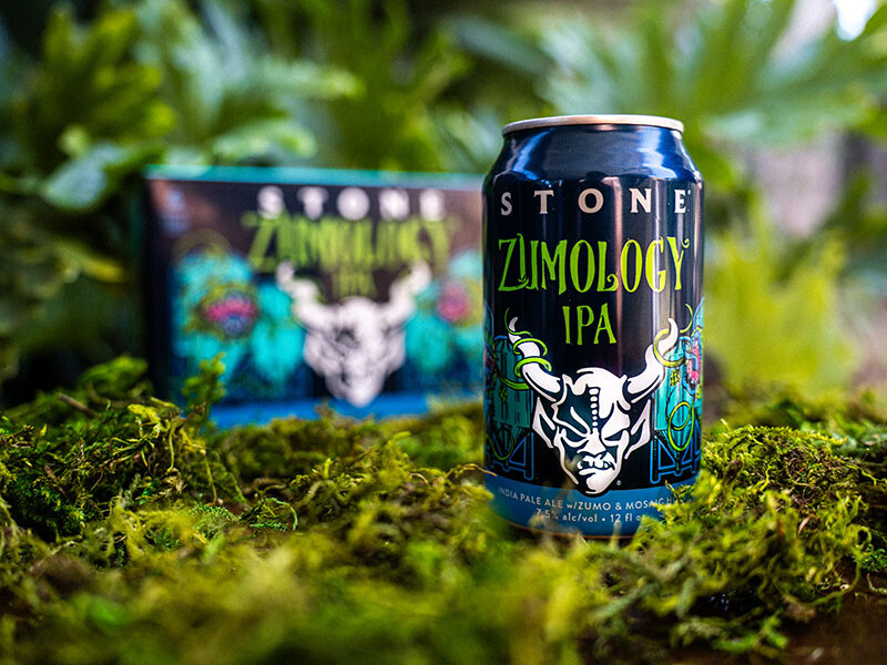 can and six-pack of stone zumology ipa amongst leaves and ferns